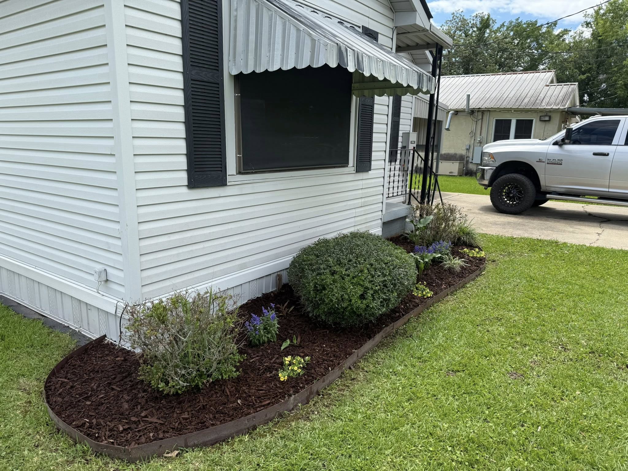 Beautiful landscaped garden after Bailey's work