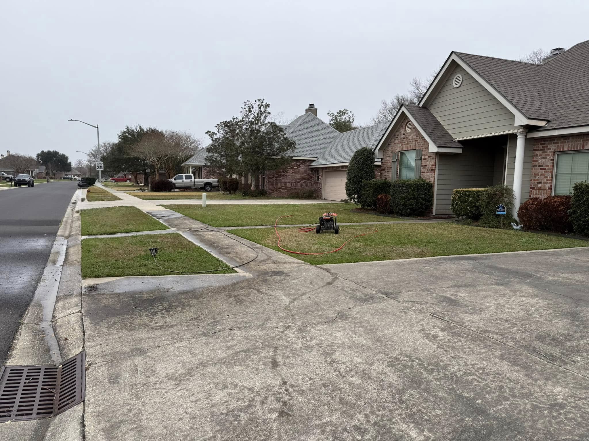Driveway before pressure washing